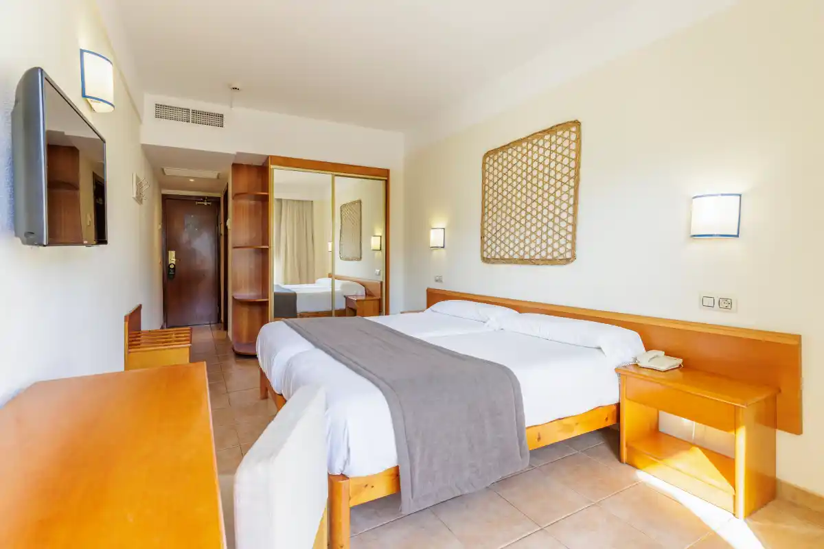 Bed in the double room at Hotel Eden Nord Sóller