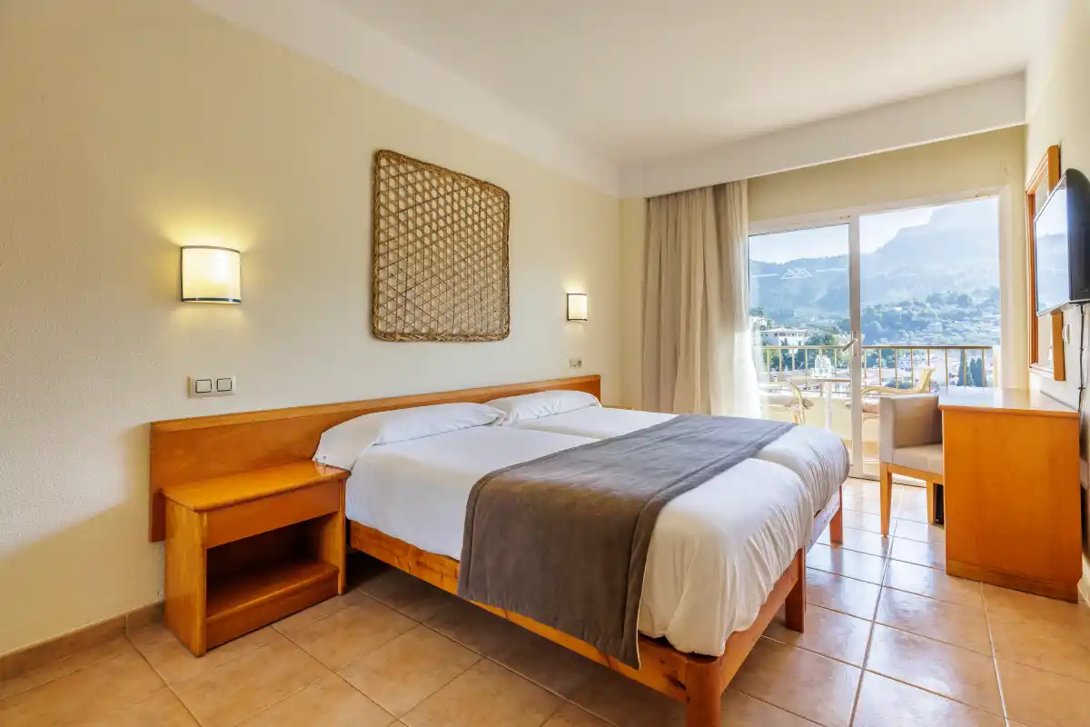 Bed in the superior room at Hotel Eden Nord Sóller