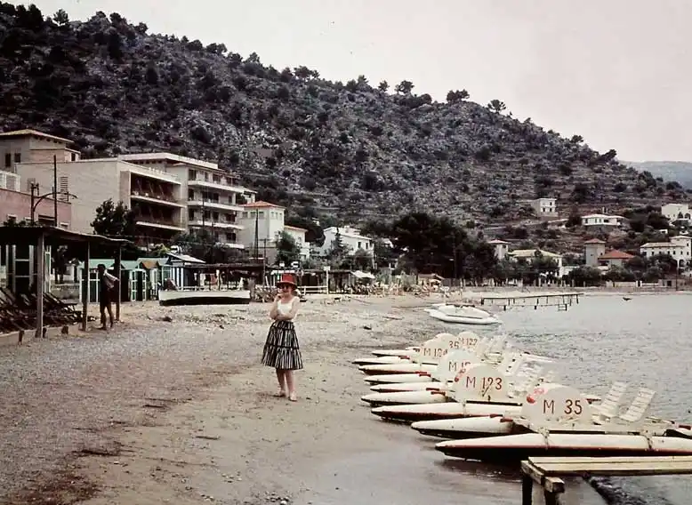 vintage photo of a woman on the beach at Eden Hotels